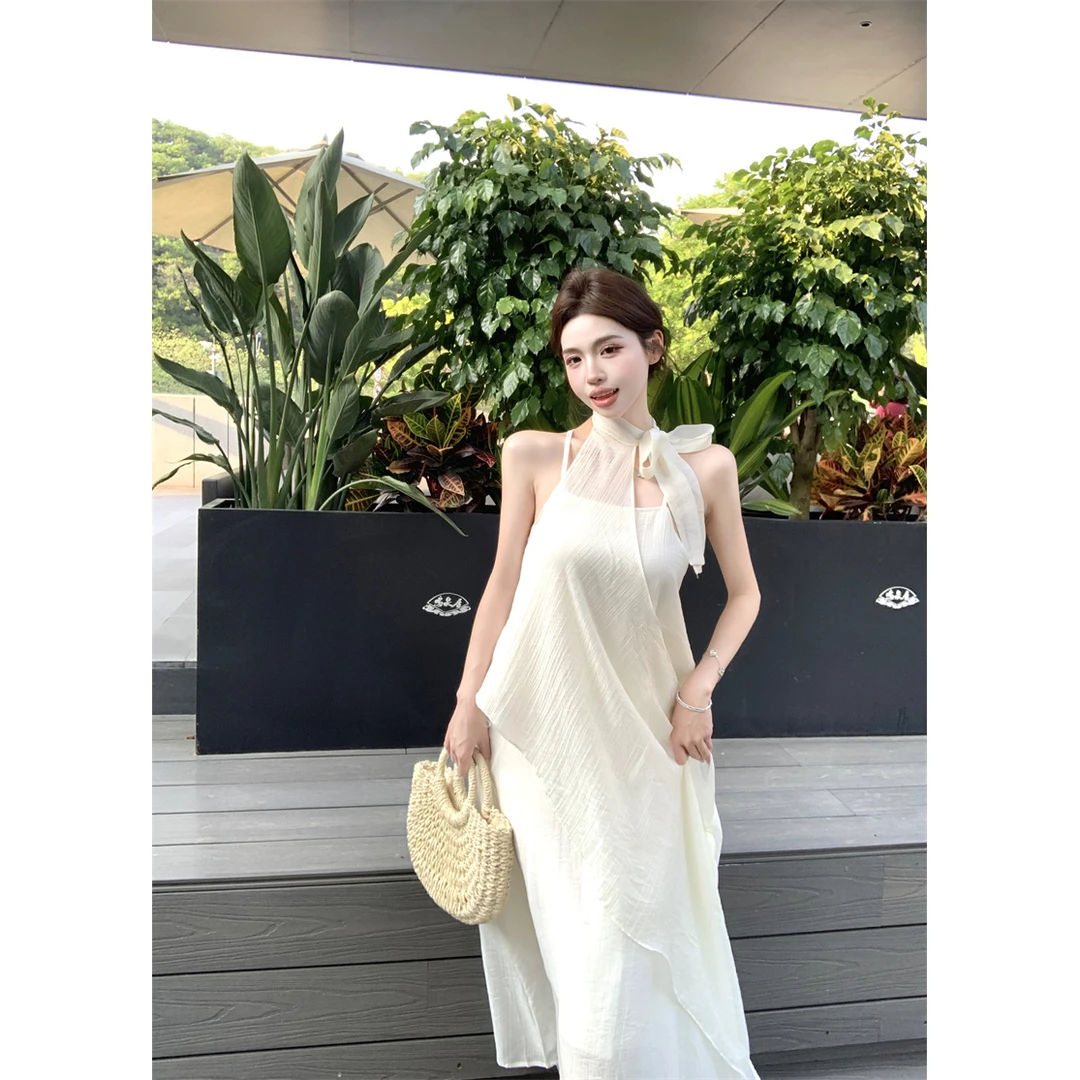 纯欲假两件不规则蝴蝶结挂脖连衣裙女夏季新款海边度假a字长裙子