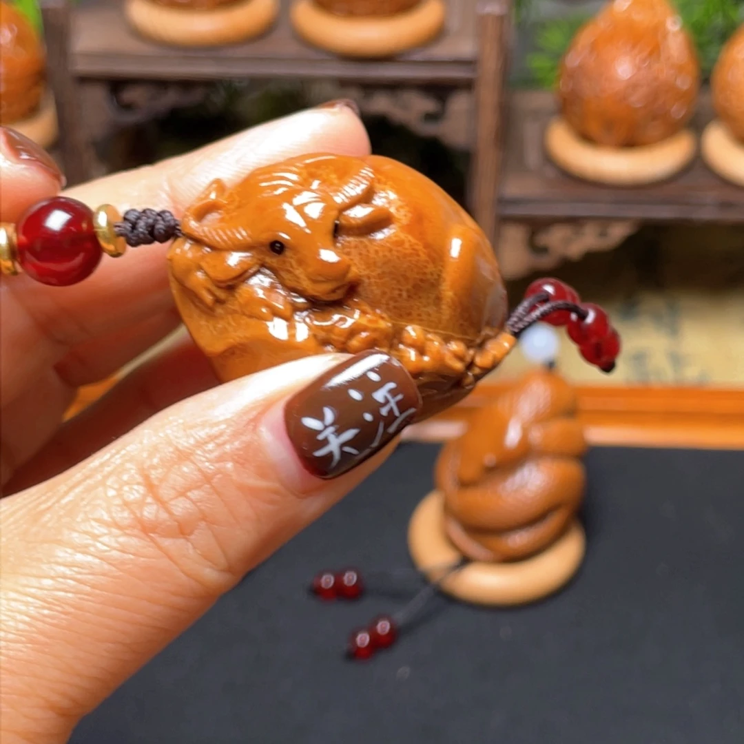 橄榄核吊坠牛掰穿配