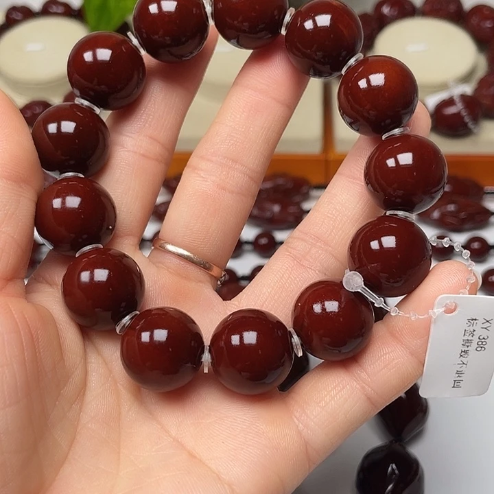 橄榄核吊坠时***明包浆玉化