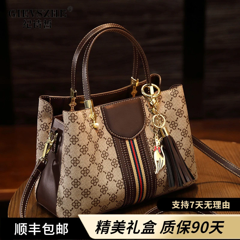 纪诗哲包包女士2026新款流行时尚复古轻奢百搭单肩斜挎印花手提包