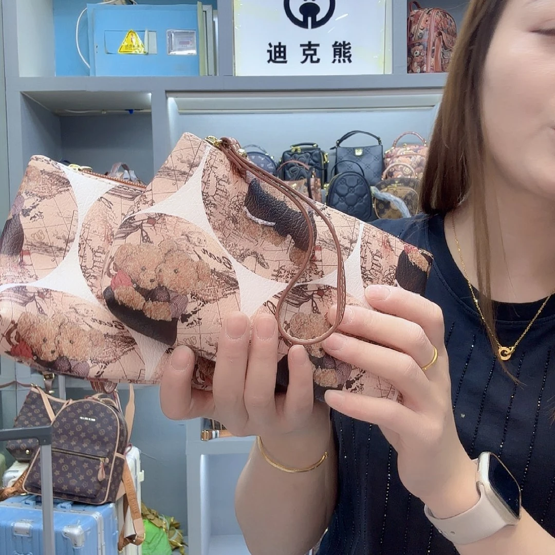 PVC1002地图手拿包化妆包