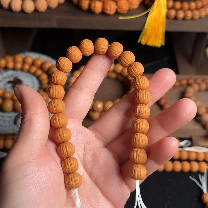 见***头猴头核桃手串去体验一下小心翼翼