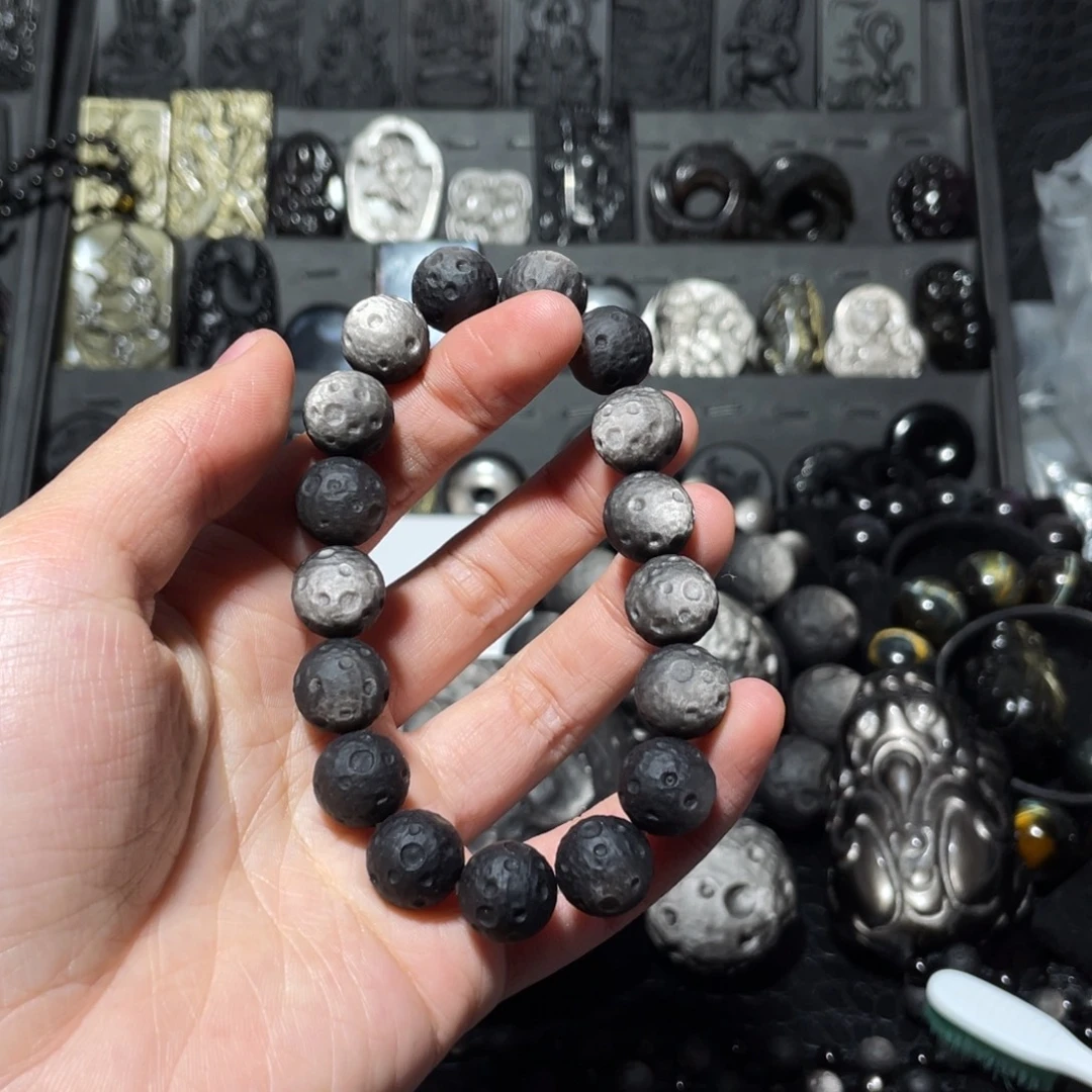 素***衣黑曜岩未镶嵌珠宝奇石