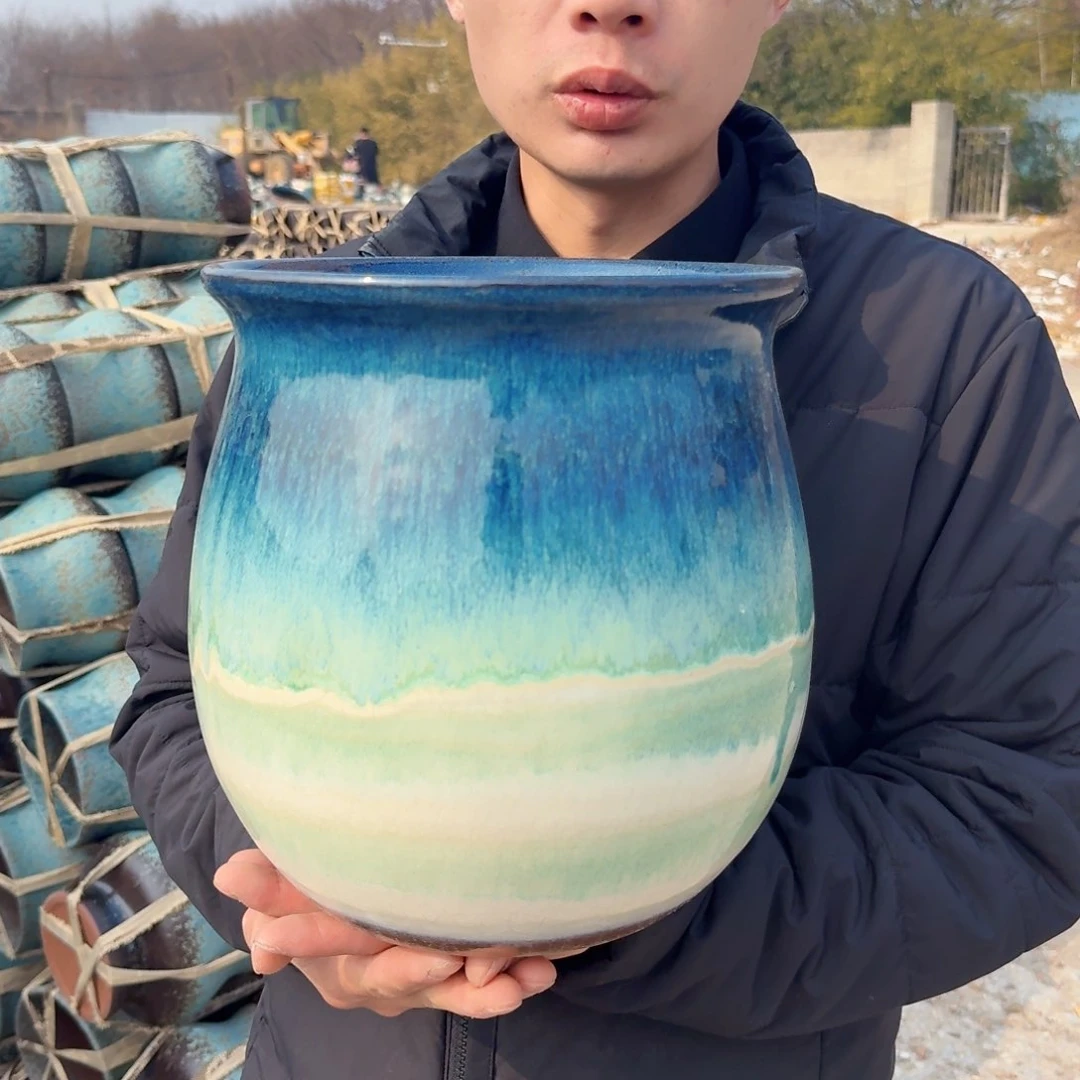 紫砂公道杯口22高26（一个水墨画