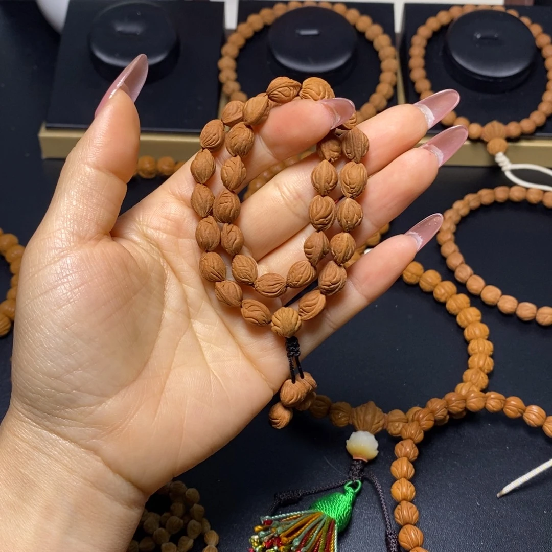 喃***️吊坠桃核秦岭文玩