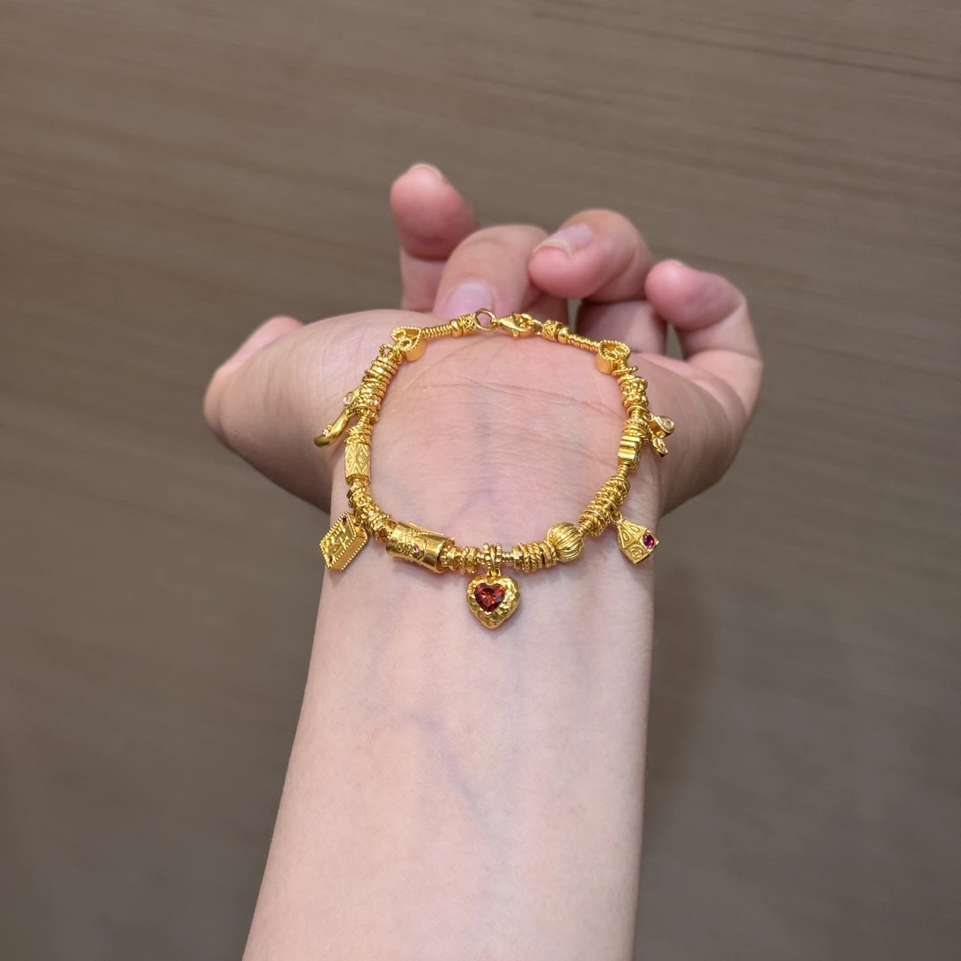 【菠萝珠宝】足金999 爱心 转金桶盘缠手链 金重：22.24克