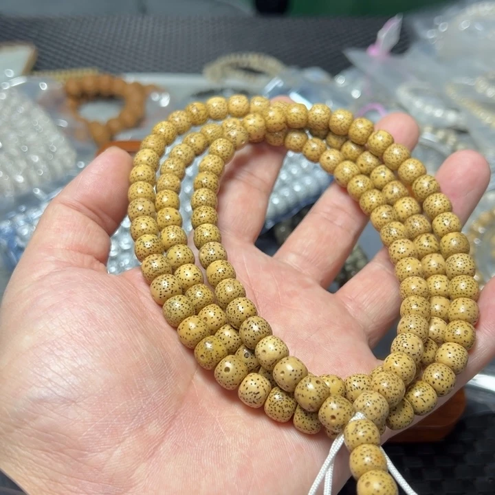 星月菩提手串鸡油黄9×8左右108颗