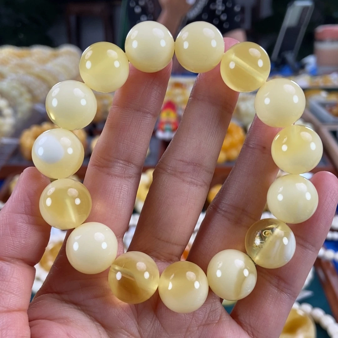 琥珀未镶嵌珠宝奇石15同料金白荧光圆珠30.68