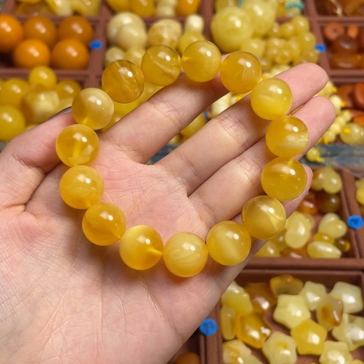 中***龍蜜蜡未镶嵌珠宝奇石聚宝盆无优化圆珠手串天然蜜蜡微瑕