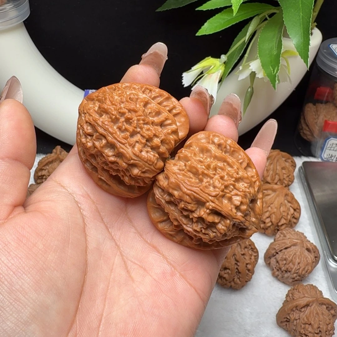 彭***动文玩核桃把件45三角白