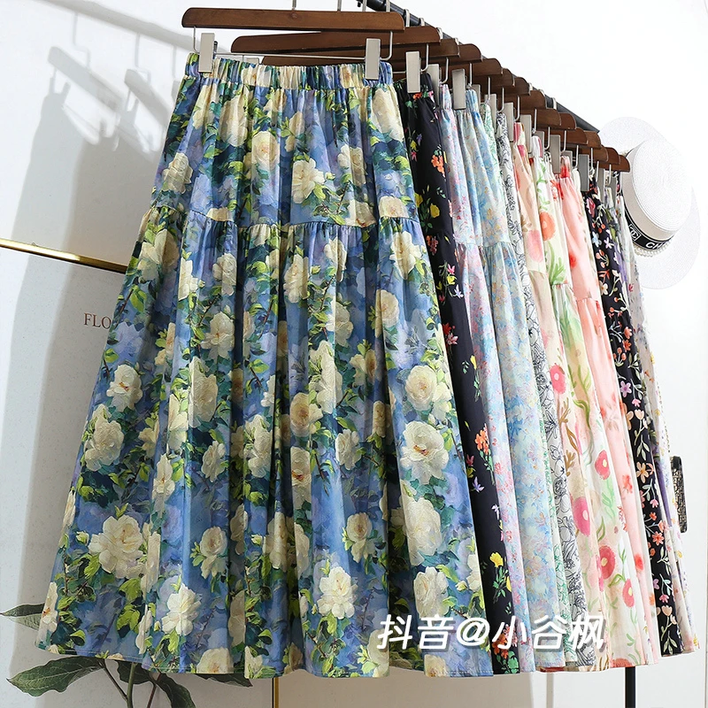 油画风印花半身裙女2025春夏新款宽松显瘦百搭中长款裙子a字伞裙