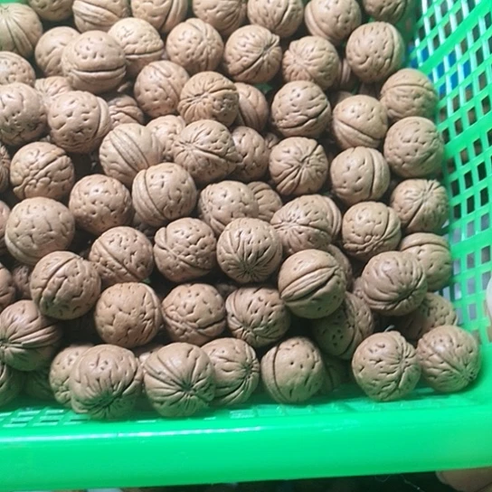 哈***啊手串桃核野生小桃核打孔定制128米不退不换