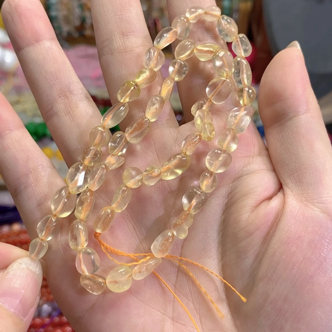 玛瑙/玉髓未镶嵌珠宝半成品黄水晶糖豆一条