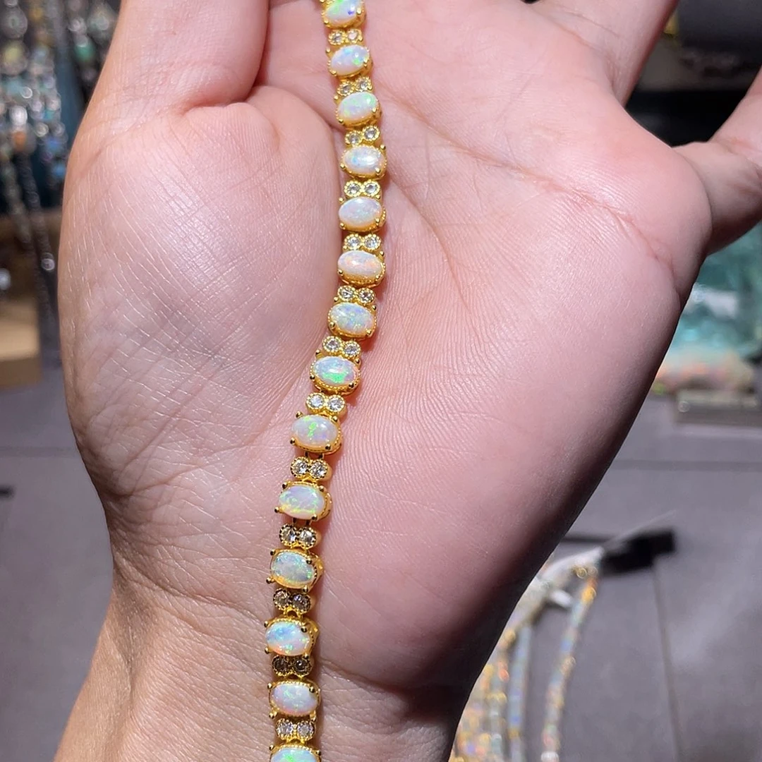 银S925镶嵌欧泊手链）。*寻