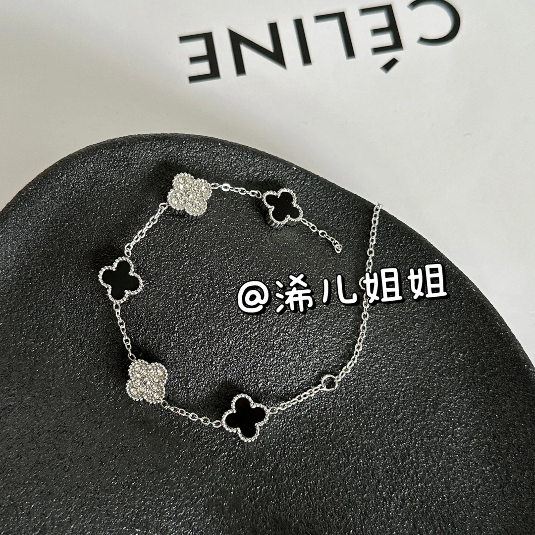 钛钢手镯 【浠儿家】超闪经典时尚镶钻四瓣花手链手镯