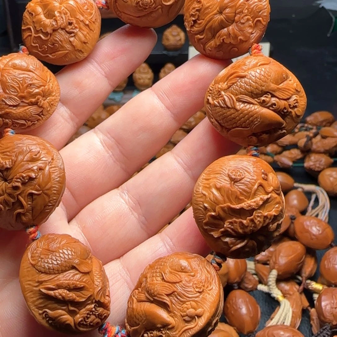 晋****橄榄核手串/手链双鱼戏莲