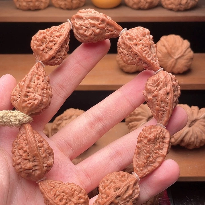 吊坠文玩核桃21头货毕业手持麒麟角