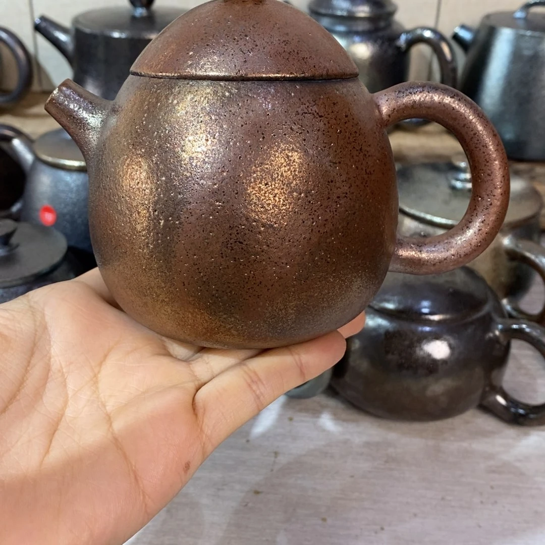 崇***业云南建水紫陶柴烧壶