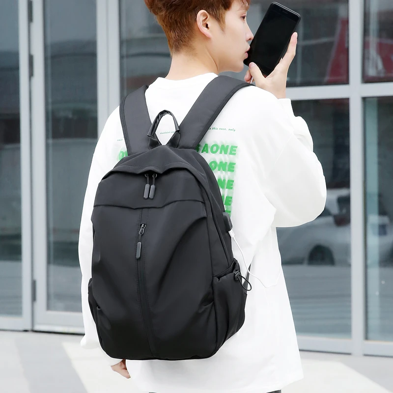 双肩包男女通用大容量男士轻便双肩包可放15.6寸笔记本休闲背包