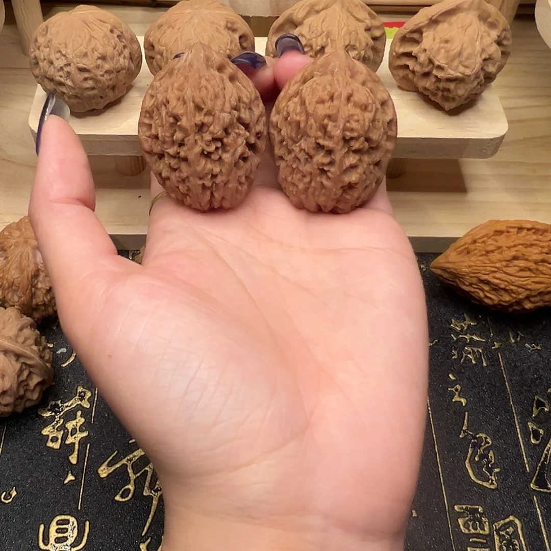 把件桃核蒜头34手把件