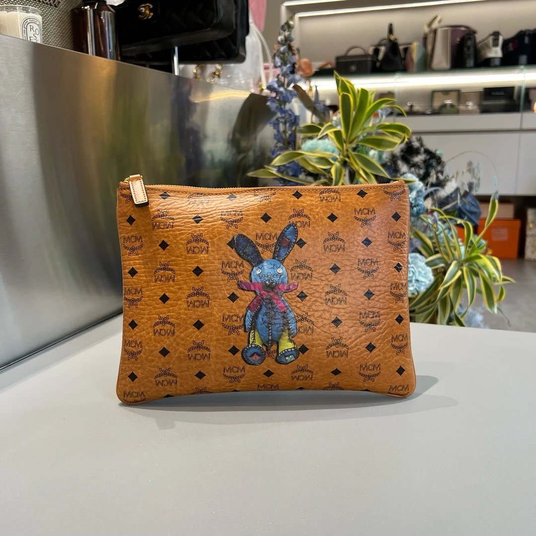 99新 MCM MCM/恩思恩 干邑色老花满印手拿包 银色拉链款 可DIY