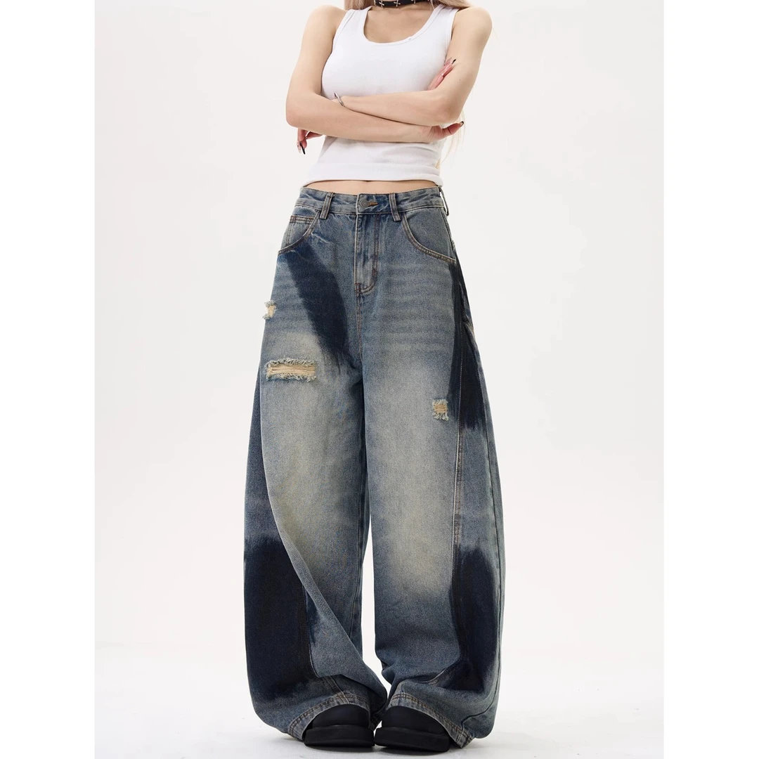 弯刀阔腿拼接解构破洞喷绘做旧牛仔裤女宽松垂感长裤