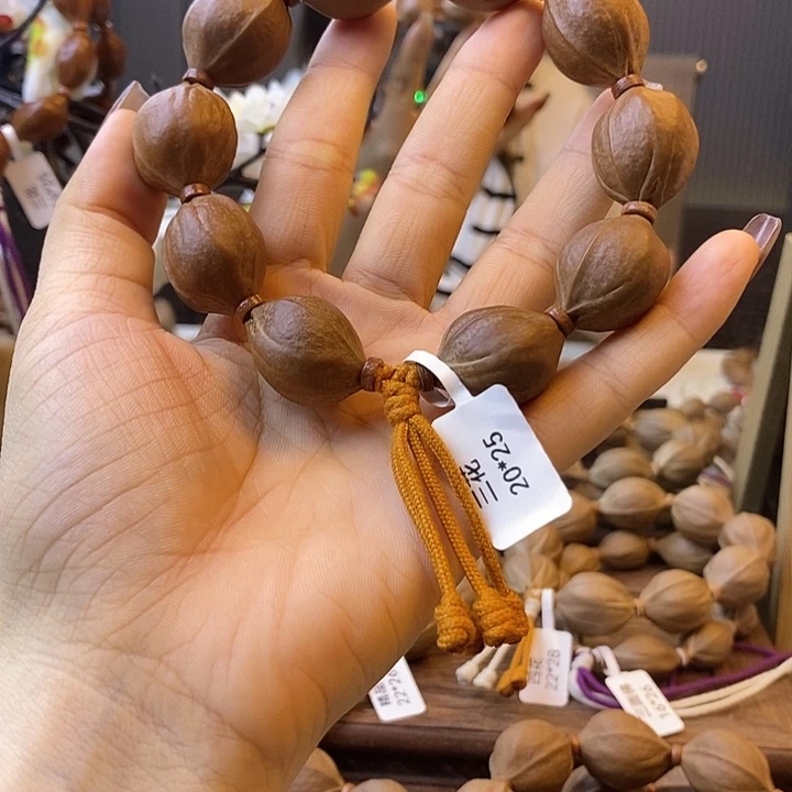 陈***淘橄榄核吊坠梅林铁核