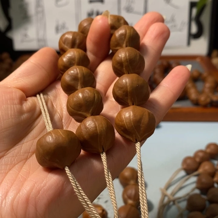 橄榄核手串8181精品蒜头铁核12+1颗