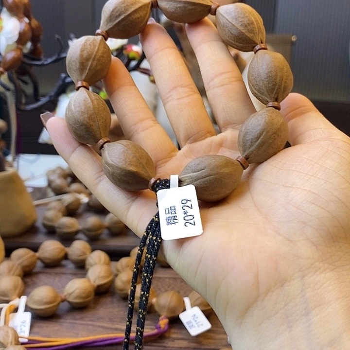 三***沾橄榄核吊坠梅林铁核
