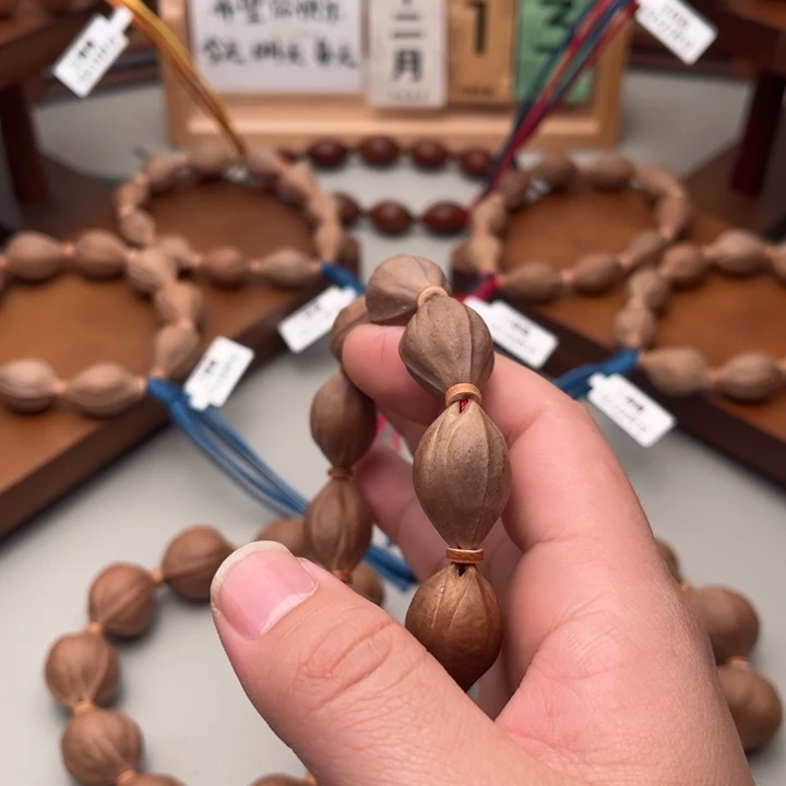 千***鲤橄榄核手串/手链三面佛