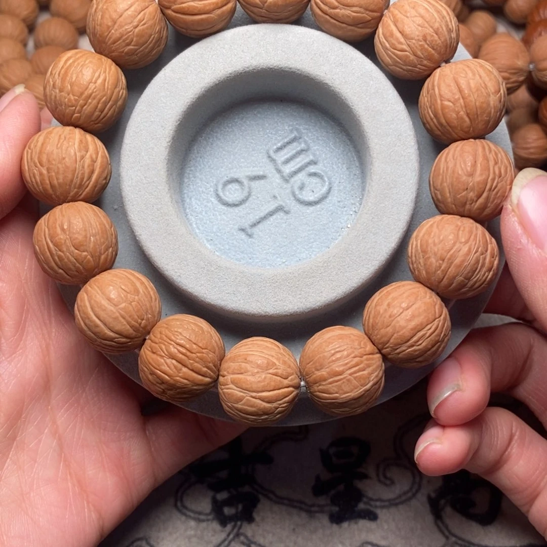 乐***事桃核手串猴头手串聚宝盆