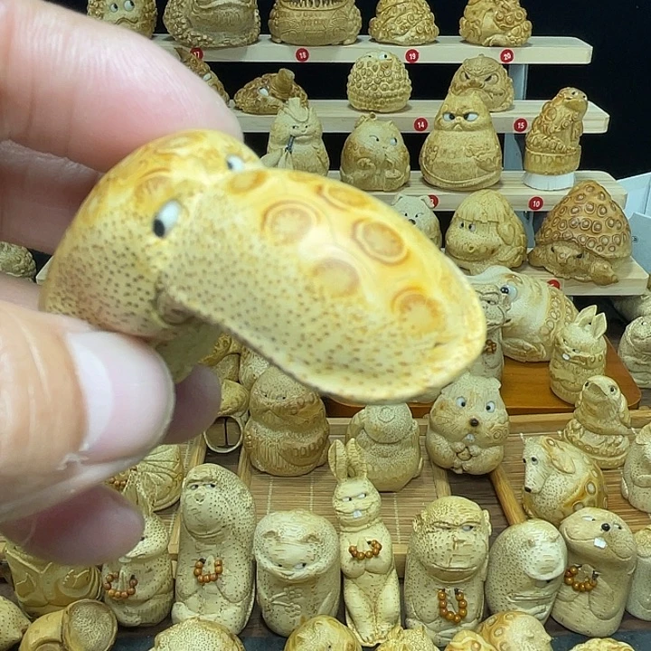 竹竹根雕鸭嘴兽手把件