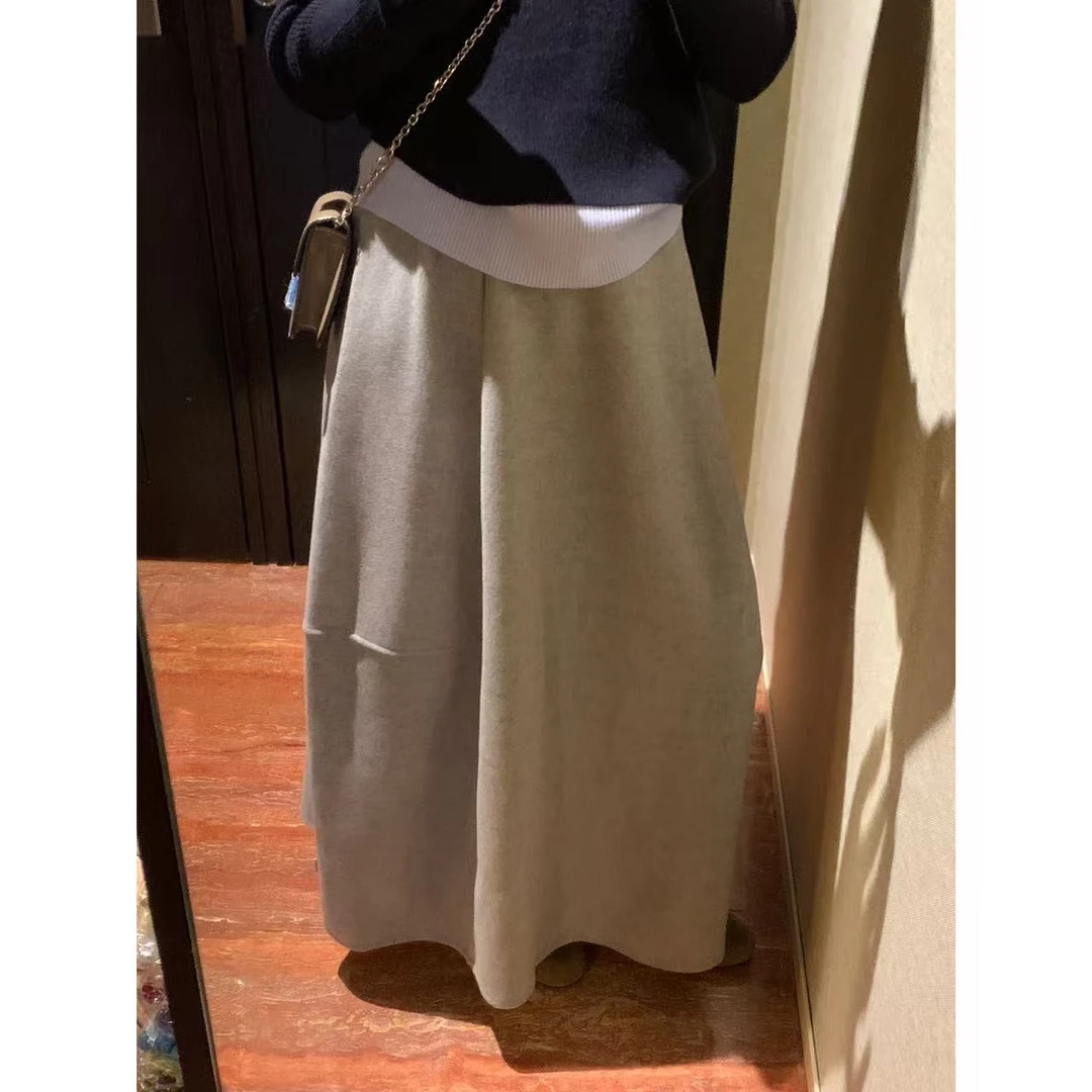 佳儿吖～秋冬呢子百搭显瘦设计感弯刀裙5036