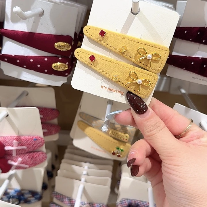 黄色三角金蝴蝶结掰掰