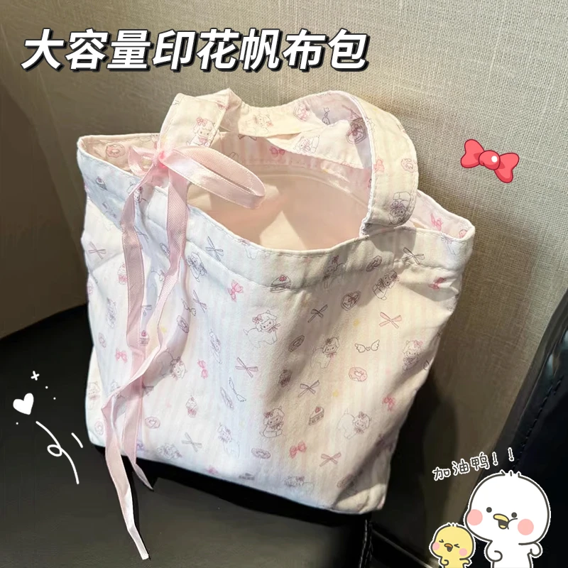 大容量碎花帆布托特包2025新款小羊卡通通勤单肩包小众手提便当包
