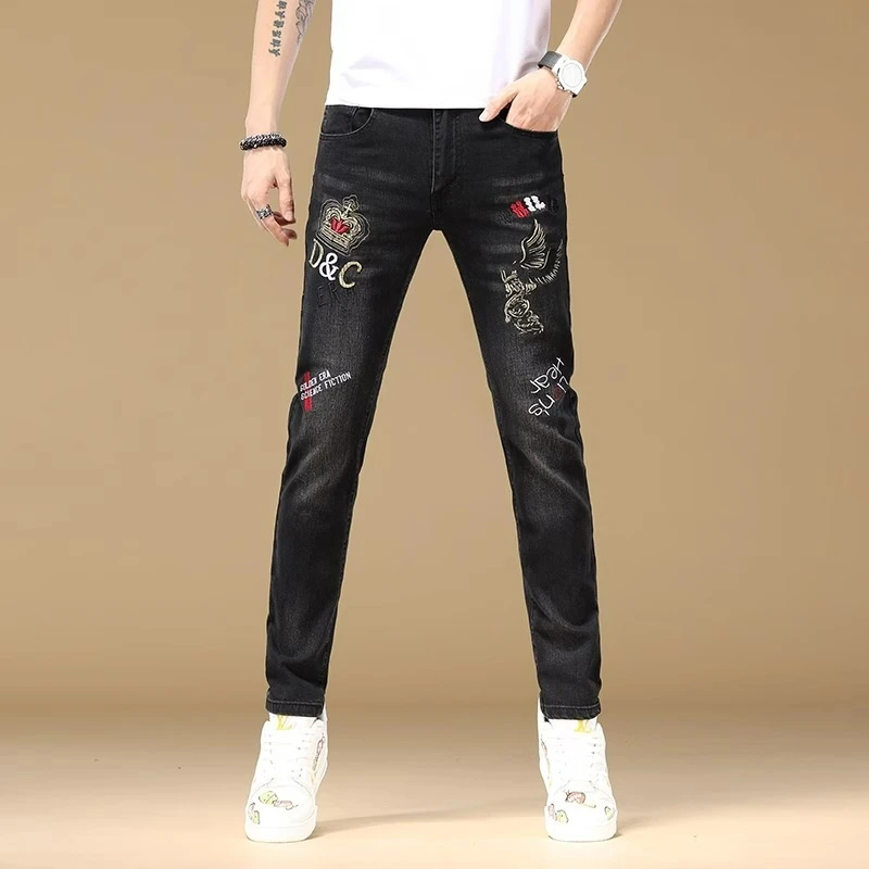 春秋刺绣牛仔裤男士潮牌韩版修身小脚休闲百搭弹力黑色长裤男潮流