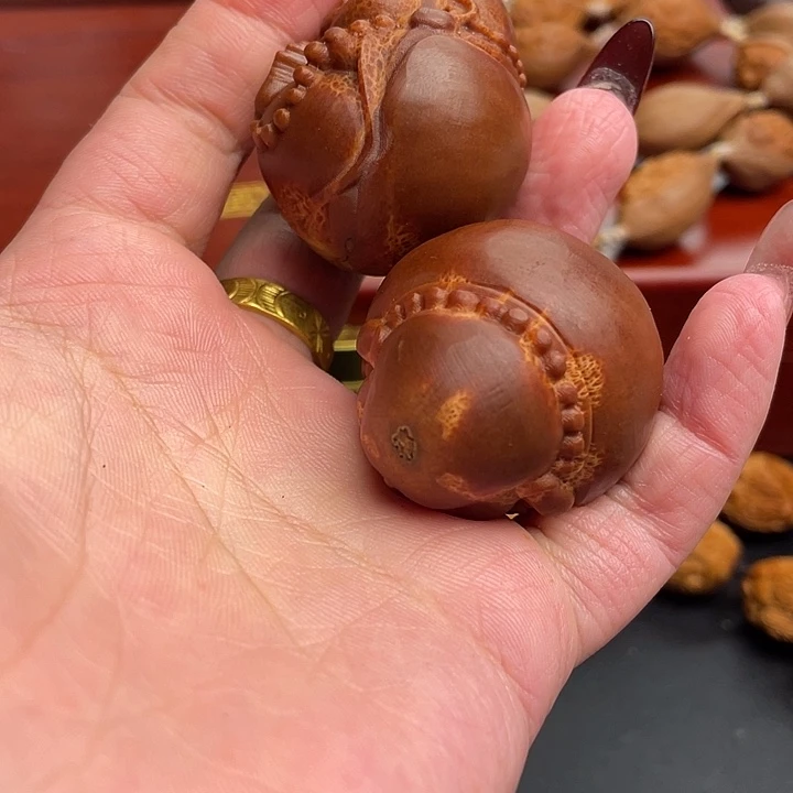 橄榄核吊坠江****添橄榄核