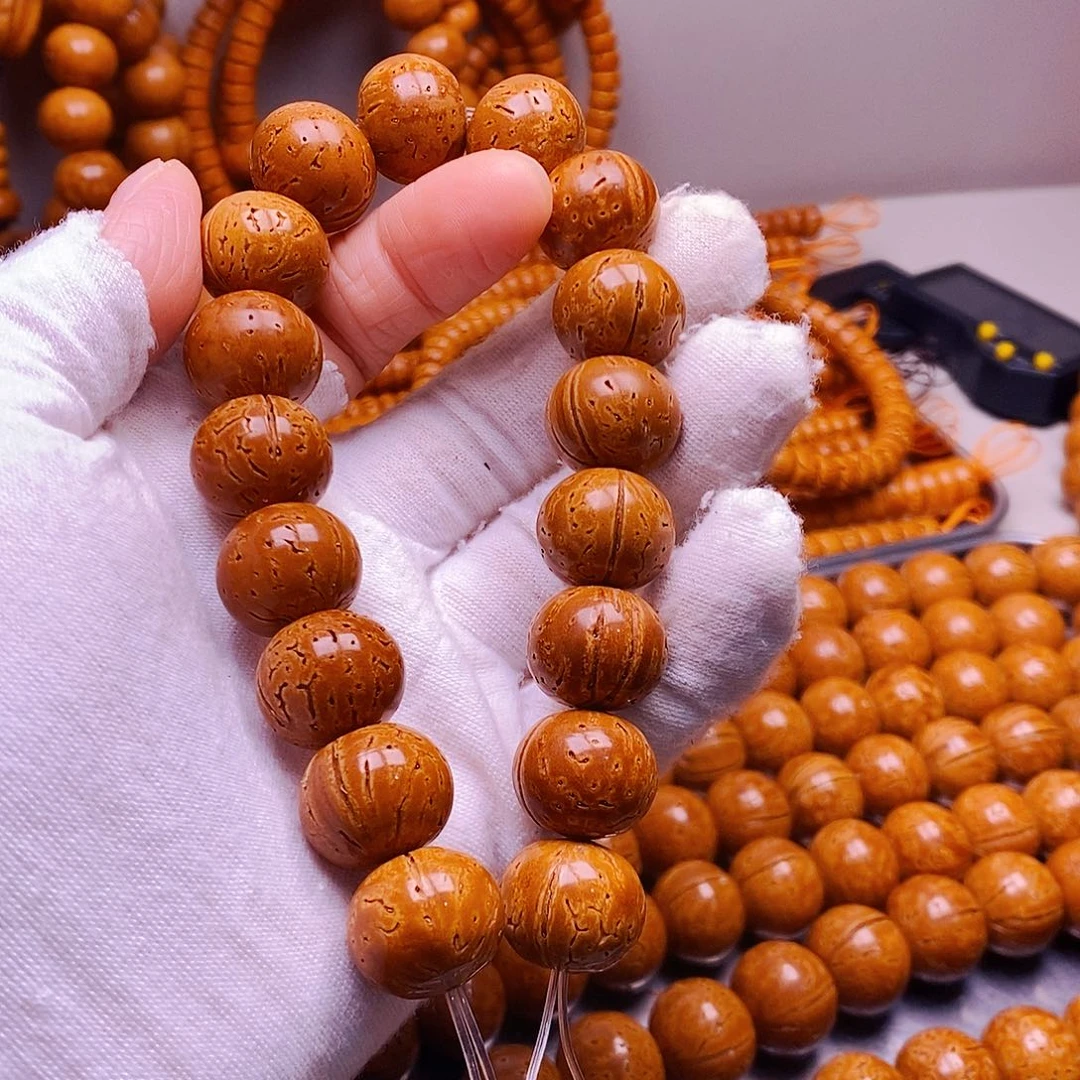 桃核吊坠16加乘13加苹果圆手串瑕疵29