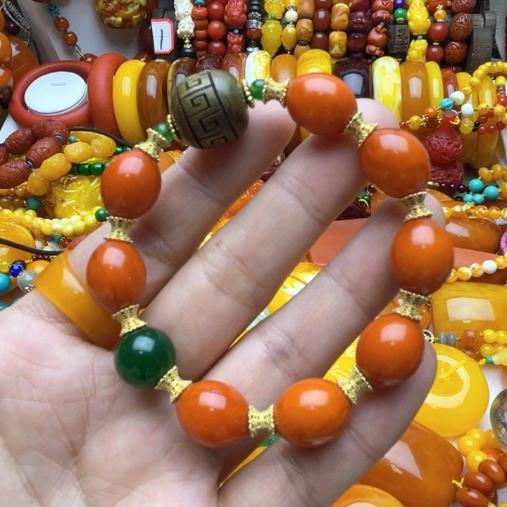 树脂制品34号橘色手串