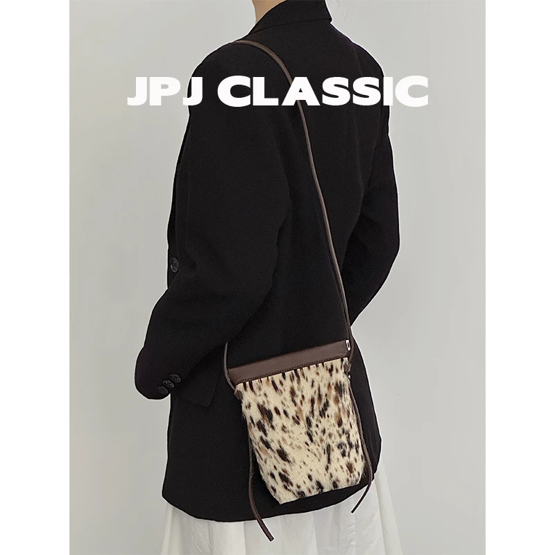 jpj秋冬马毛手机包女单肩斜挎简约水桶包通勤包可爱小包包1916