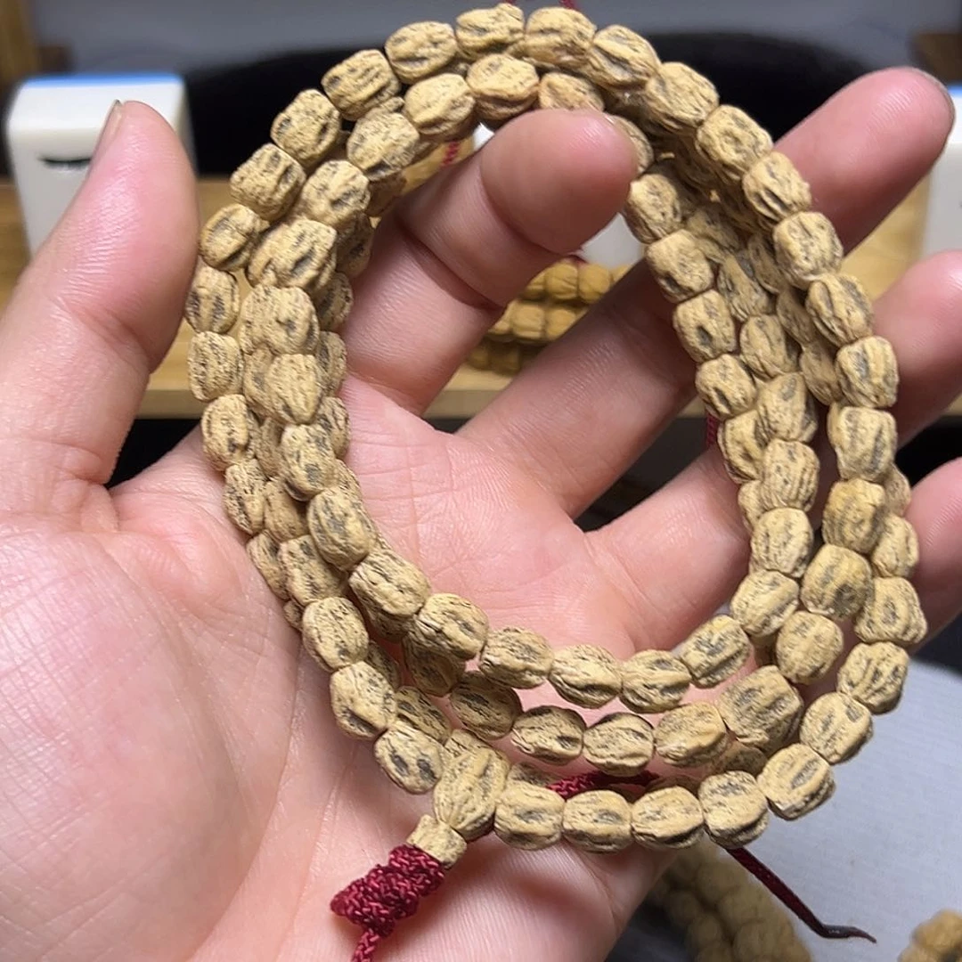 摩***代柏香籽/百香籽吊坠