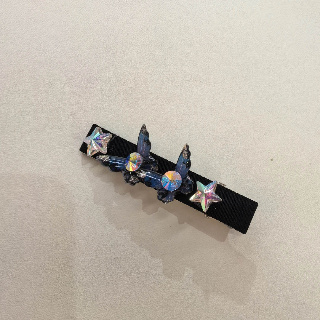 E372蓝色蝴蝶星星闪闪边夹