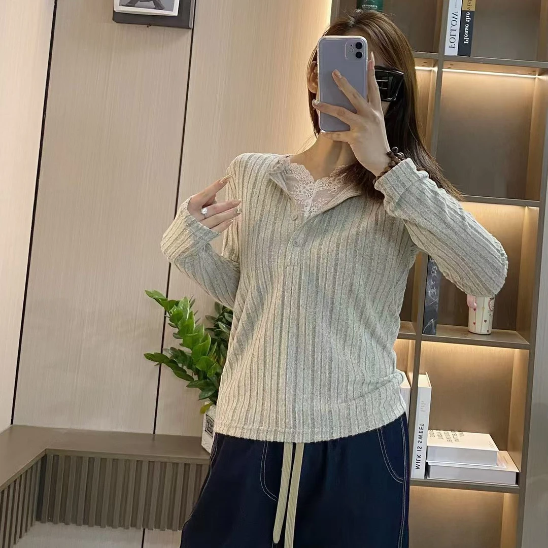 7916韩版休闲蕾丝拼接假两件上衣
