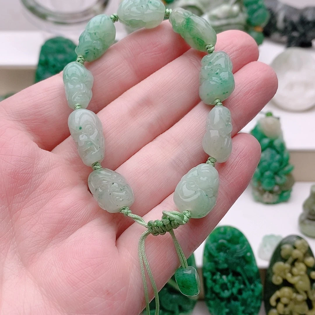 独山玉未镶嵌珠串馬**功