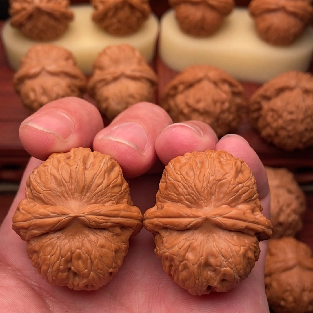 桃核把件姚**口粗筋元宝38