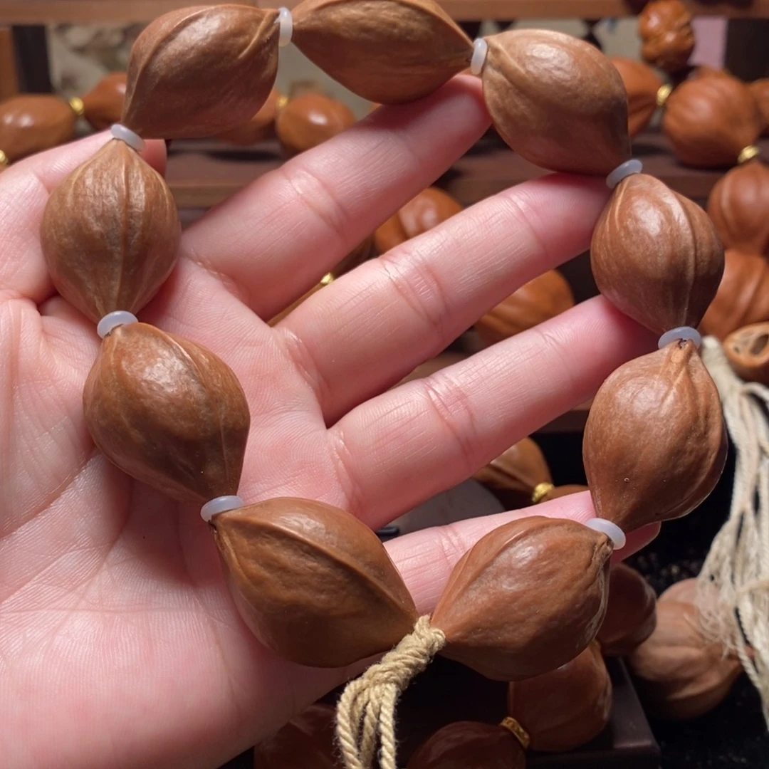 橄榄核手串/手链2.1三花铁素9颗