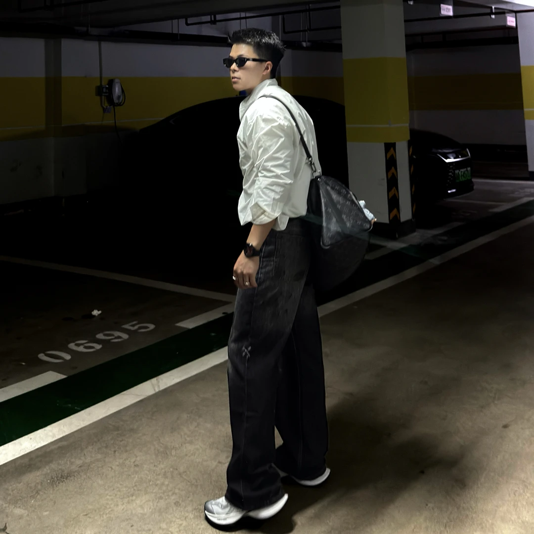 AC风格2021M版型黑色泼墨设计微喇牛仔裤男女同款