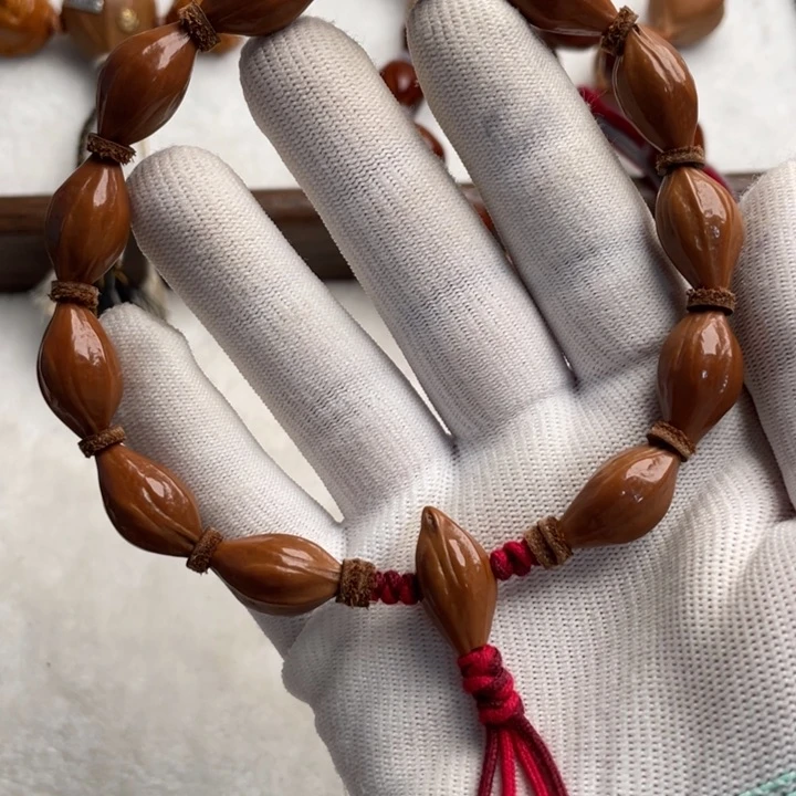 橄榄核吊坠橄榄手持