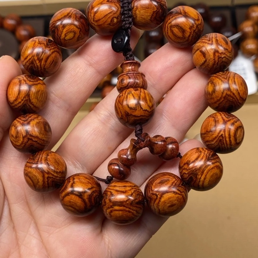【闪购商品】黄花梨/降香黄檀手串/手链用****5海南黄花梨对眼鬼脸