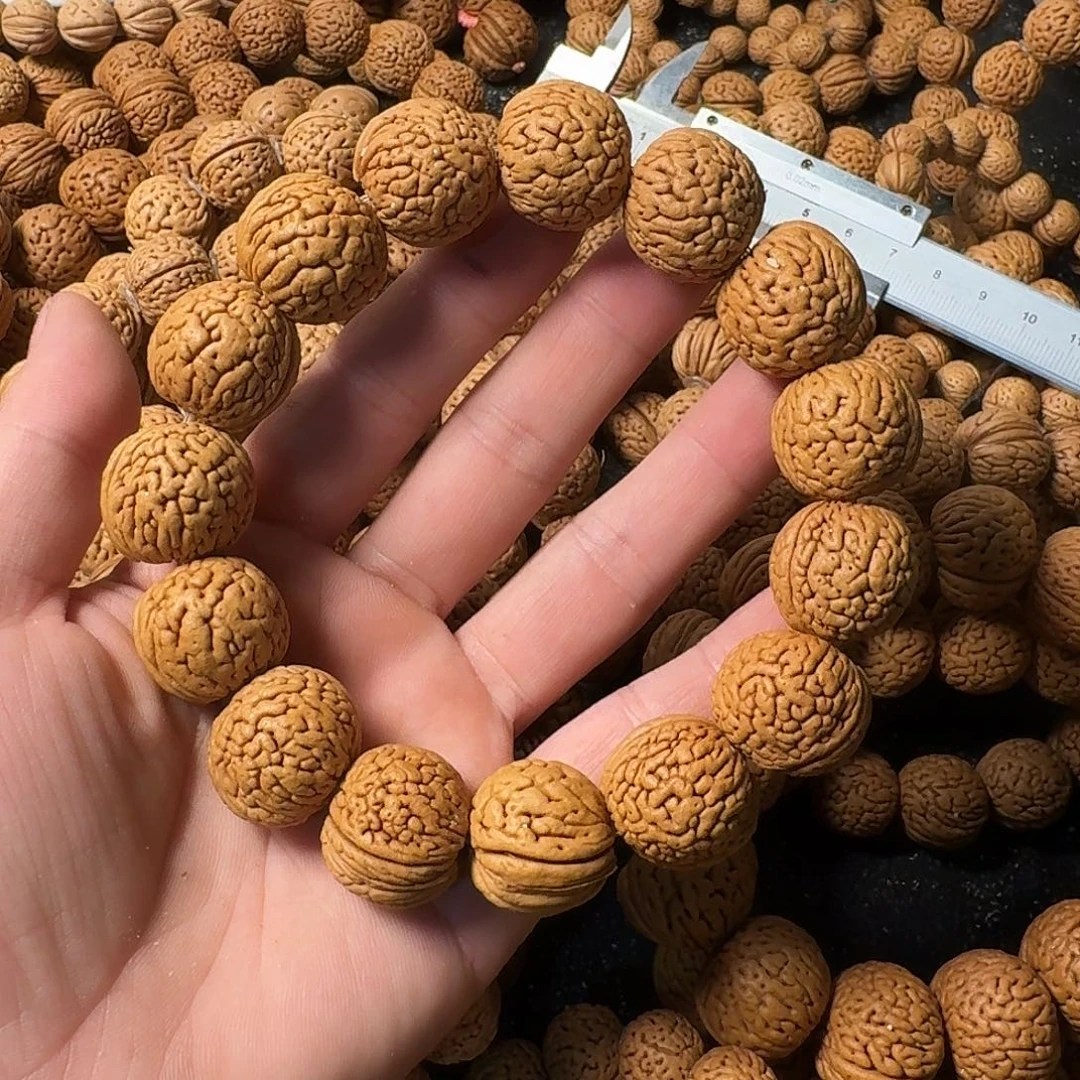 潇***宿吊坠桃核野生肌肉手串